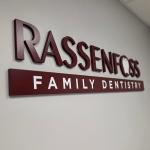 Rassenfoss Family Dentistry logo wall