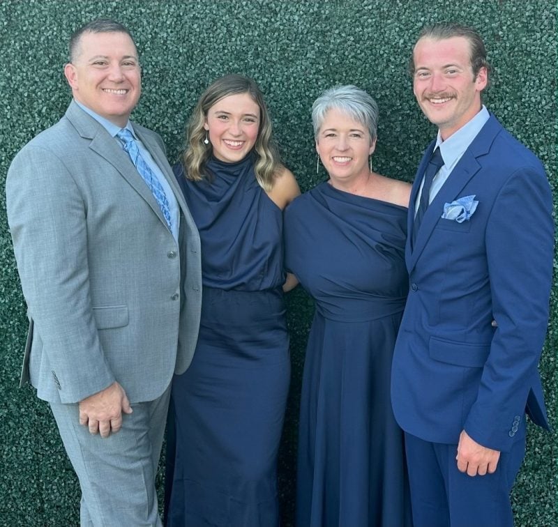 Group photo of Dr. Rassenfoss with her husband, son, and daughter